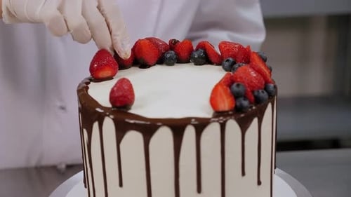 Delicious Cake Decorated with Strawberries and Blueberries
