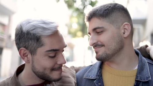 Lgbt Gay Male Couple Having Tender Moment Hugging Outdoor in the City