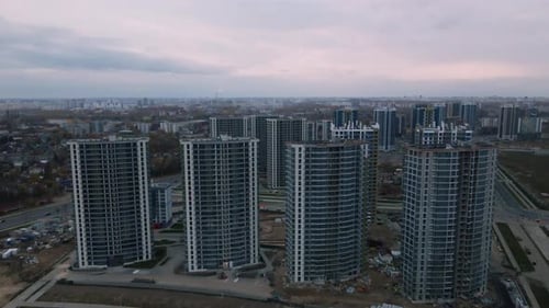 Construction of modern multi-storey buildings. Construction of a new city block.