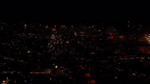 Sparkling Fireworks All Over The City Of Iceland During New Year's Eve Celebration. Aerial Shot