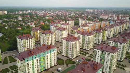 Aerial view of city residential area with high apartment buildings.