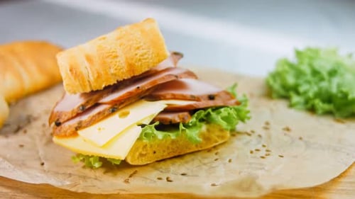 Delicious Sandwich with Meat and Cheese on Bread