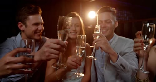 Friends Toasting Champagne at an Elegant Celebration