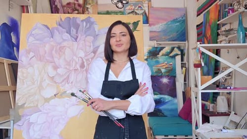 Portrait of Talented Female Artist Wearing Apron