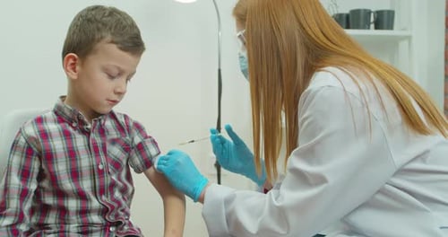 Child Receiving Injection from Healthcare Worker