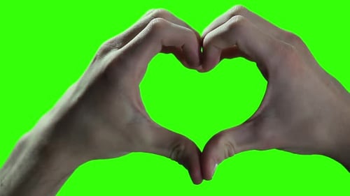 Hands Making a Heart Symbol on Green Chroma Background