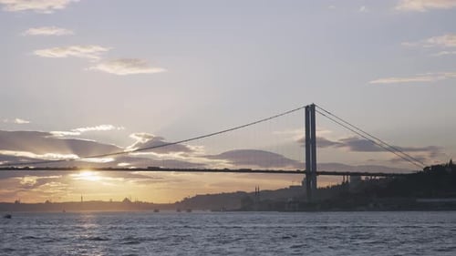Morning haze above the water and beautiful bridge