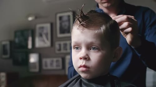 Sweet Child Getting Haircut at Home