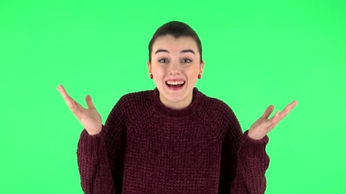 Very Surprised Girl with Shocked Wow Face Expression . Green Screen