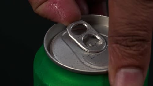 Opening Refreshing Green Soda Can Close Up
