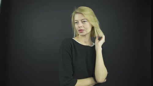 Attractive Blond Woman Posing and Smiling