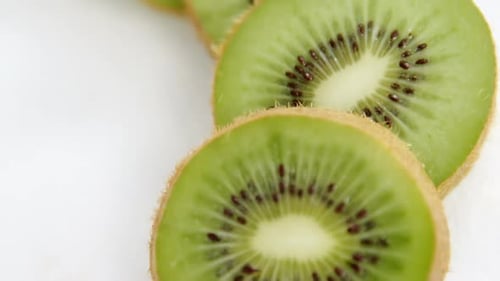 Kiwi slices on white background