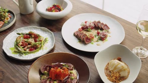 Set Table with Gourmet High Kitchen Dinner Plates and Dishes at the Restaurant