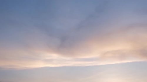 Beautiful Clouds at Sunset with Pink and Blue Sky