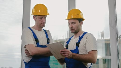 Construction specialist using a tablet computer.