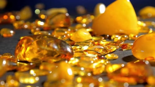 Yellow Transparent and Matt Amber Stones of Different Size