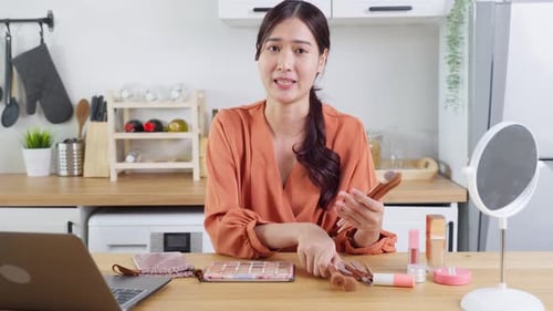 Stylish Woman Explains Makeup in Bright Kitchen