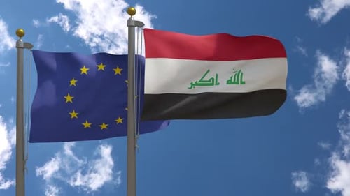 European Union and Iraq Flags Waving on Flagpoles