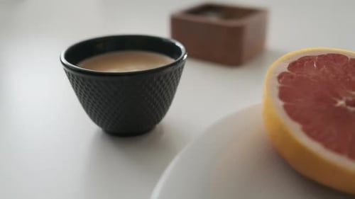 Healthy Breakfast with Fried Egg, Coffee, and Fruit