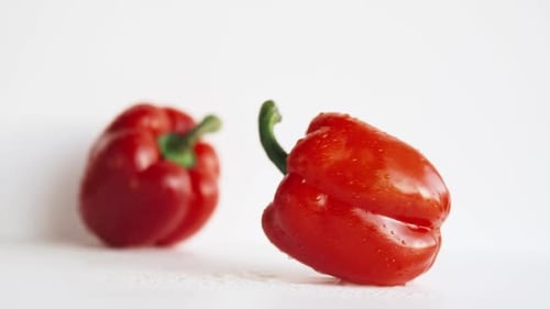 Fresh Red Bell Peppers on White Background