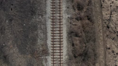 Aerial View of Railroad Tracks in Countryside