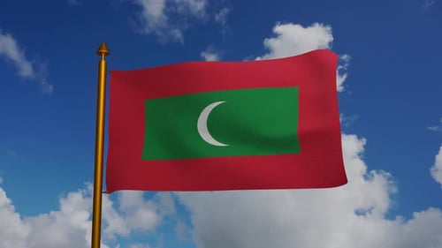 Maldives National Flag Waving in Wind Against Blue Sky
