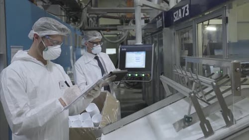 Scientists working in laboratory