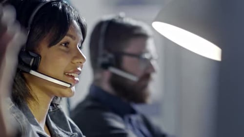 Mixed-Race Woman Working in Call Centre