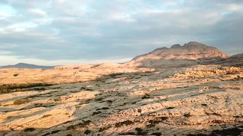 Aerial View of Rugged Landscape at Sunrise