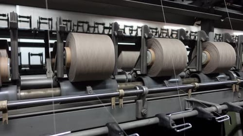 Spinning Yarn in Industrial Weaving Machine