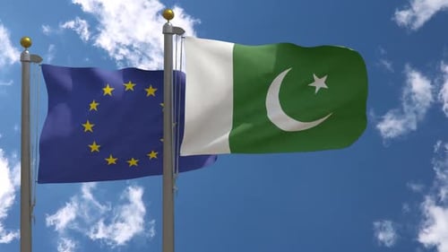 European Union and Pakistan Flags Waving Under Blue Sky