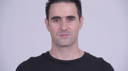 Close Up Portrait of Man Looking at Camera