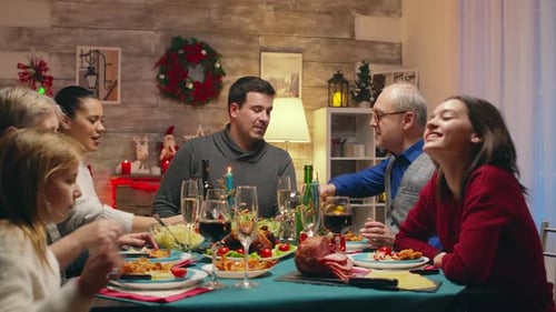 Family and Friends Celebrate Holiday Dinner Together