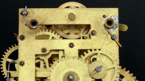 Intricate Clockwork Gears Turning Time in Close Up