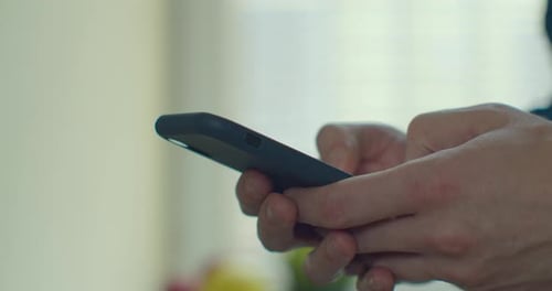 Hands of Young Man Using Smartphone at Home Office. Communication, Online Shopping, Chat, Social