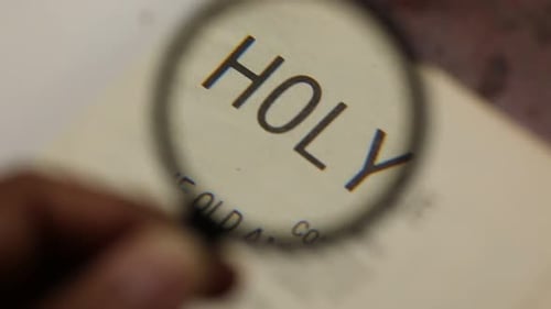 Magnified View of Holy Bible Pages