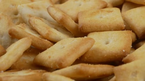 Pile of Crispy Golden Brown Salty Crackers
