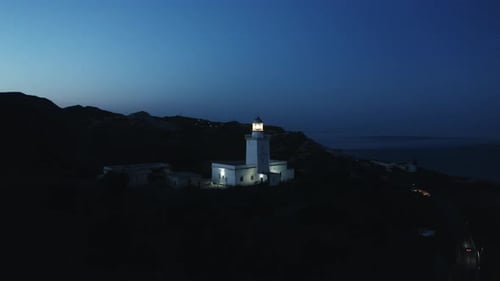 Lighthouse By Night