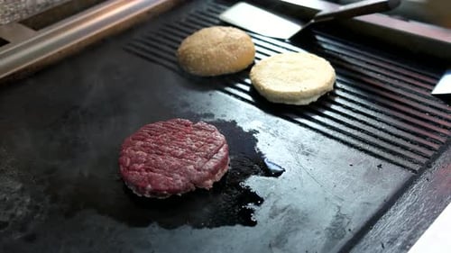 Preparing Burgers and Toasting Buns on the Grill