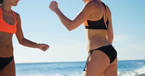 Joueuses de volley-ball se donnant un coup de poing 4k