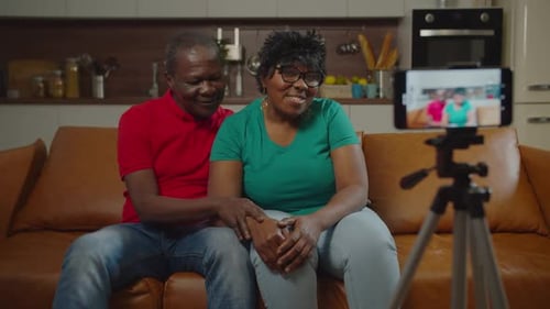 Loving Couple Recording Themselves on Smart Phone