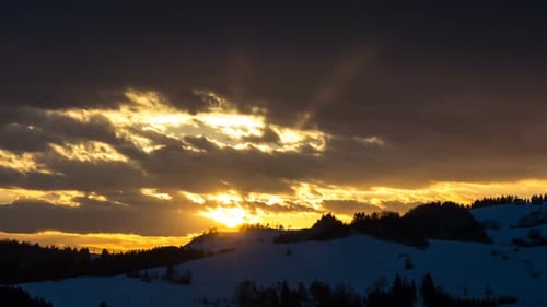 Snowy Mountains at Sunset