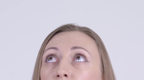 Close Up of Woman Looking Upward