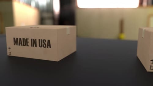 Boxes with MADE IN USA Text on Conveyor