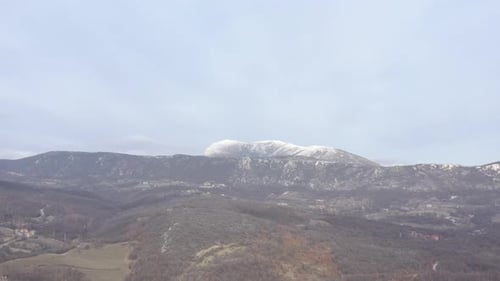 Top of Stol mountain under snow 4K aerial video