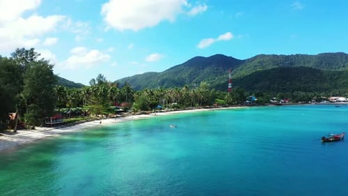 Aerial tourism of paradise resort beach wildlife by blue green sea with white sandy background of ad