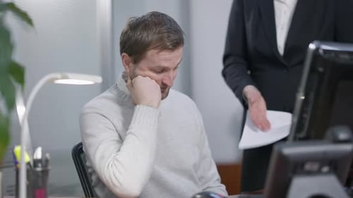 Incompetent Male Employee Scolded By Unrecognizable Boss in Office