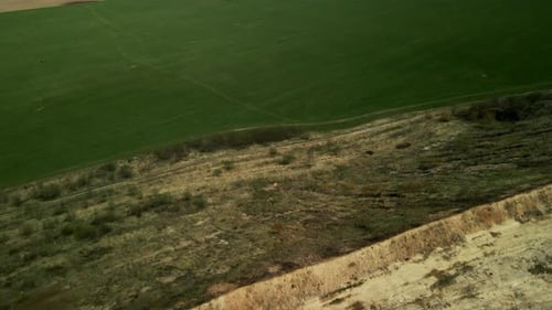 Aerial View of Green Field and Sand Quarry
