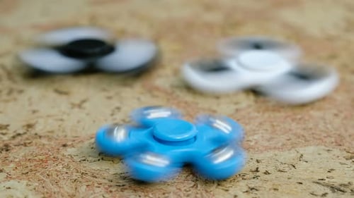 Spinning Fidget Spinners in Blue Black and White
