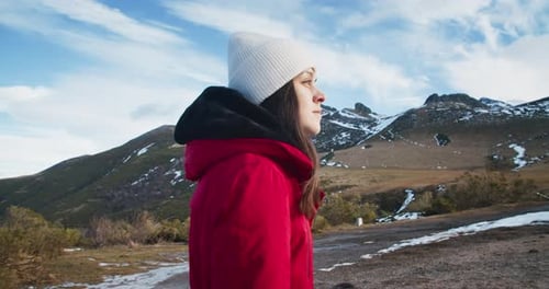 Portrait of Young Adult Woman Climbing Up the Mountain